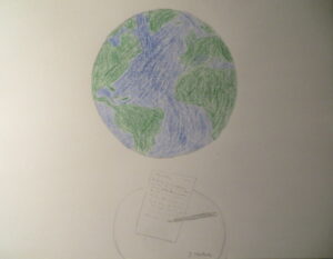 The world, and a letter written below it, with a pencil